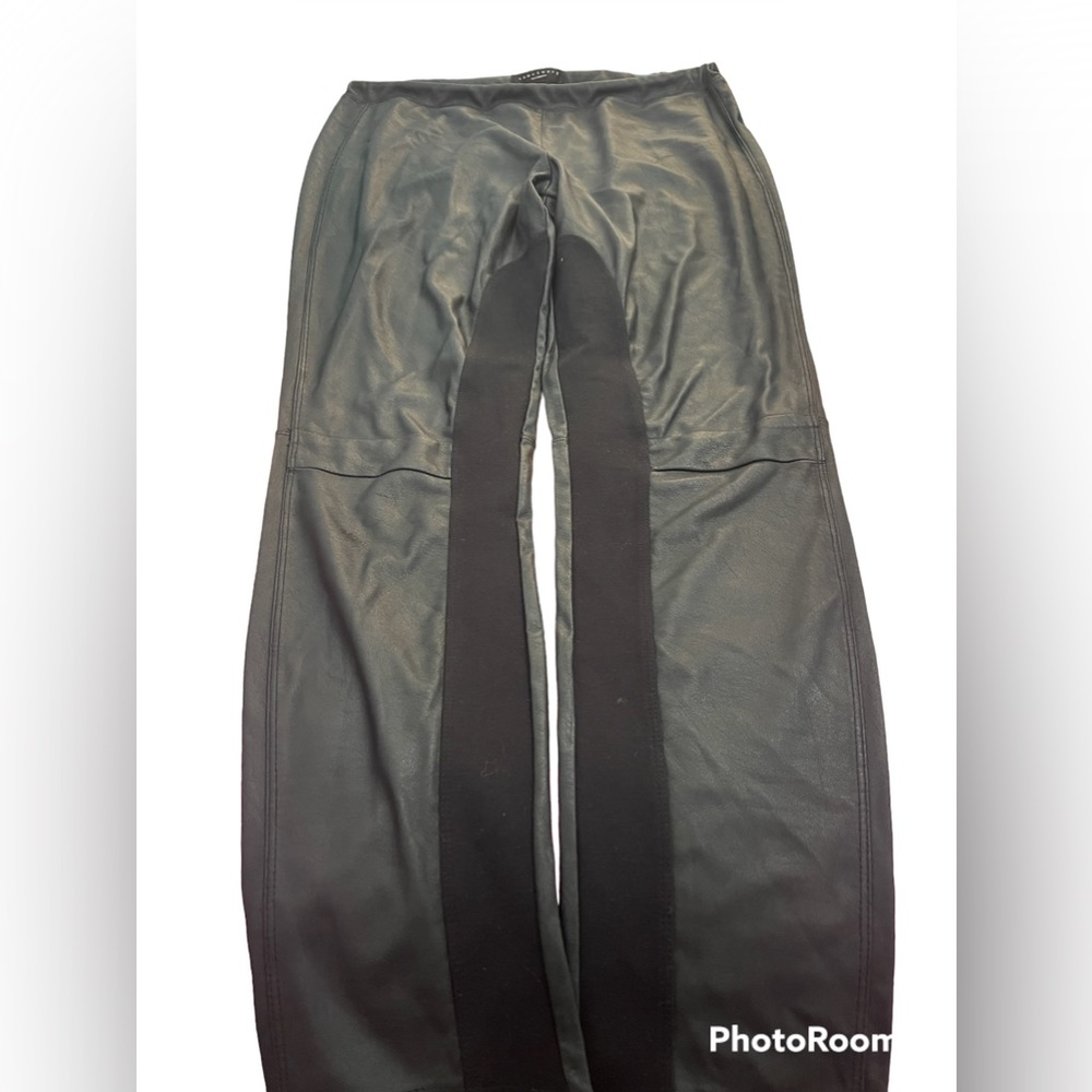 Large faux leather leggings.